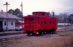 Freshly painted caboose, no reporting marks